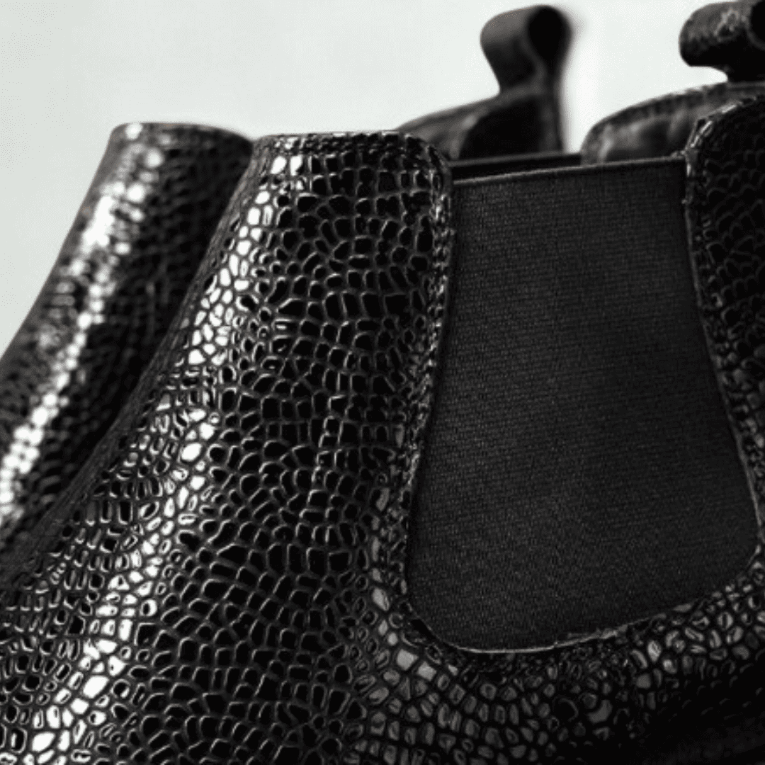 FORCIANO CROXTON black textured leather Chelsea boots close-up focusing on the glossy upper pattern and black elastic gusset.
