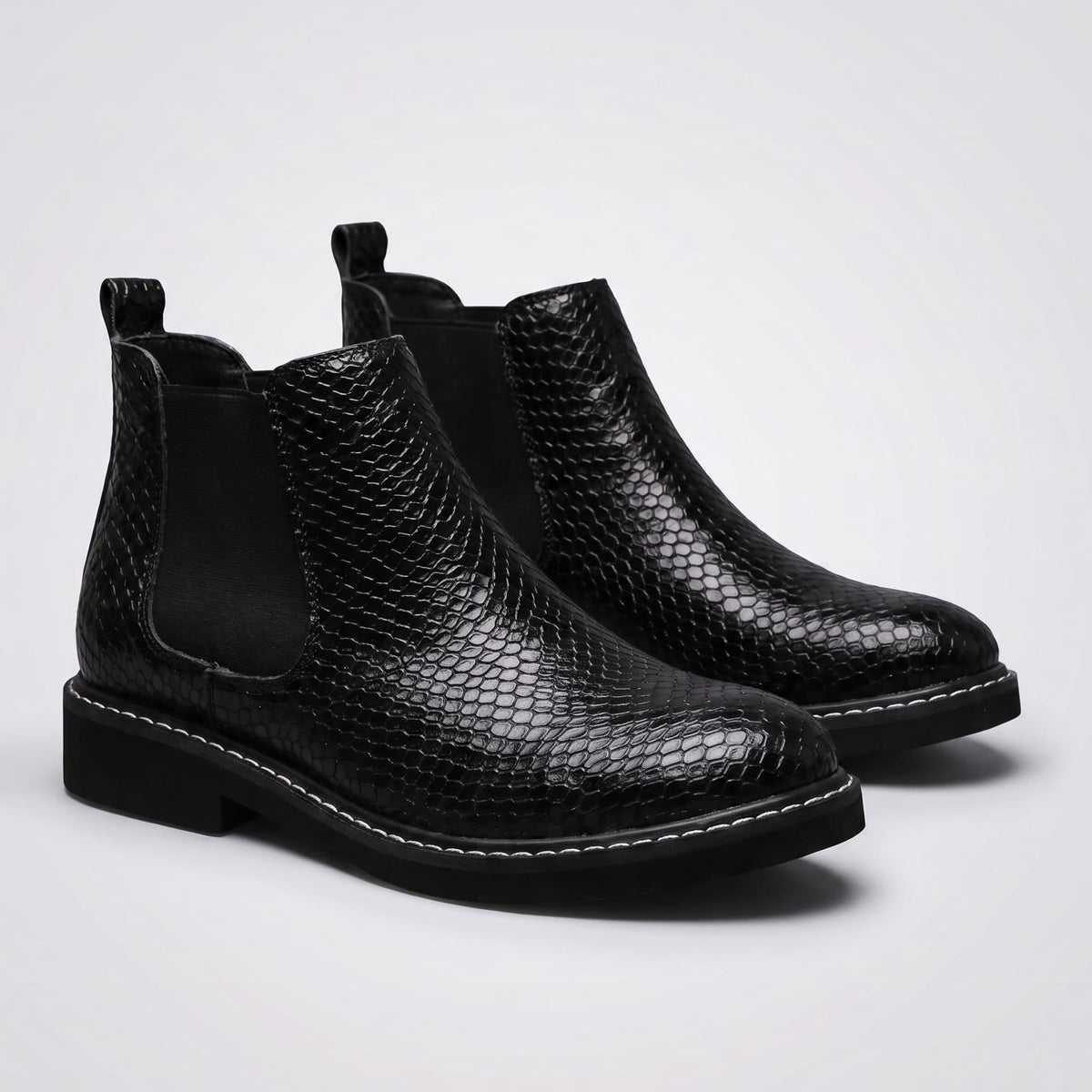 FORCIANO CROXTON Elevator Boots in black premium leather, pair shown from a front three-quarter angle with textured finish