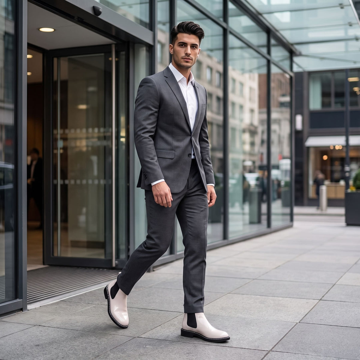 FORCIANO CROXTON Elevator Boots in white premium leather worn by a man walking in a gray suit outside a modern building