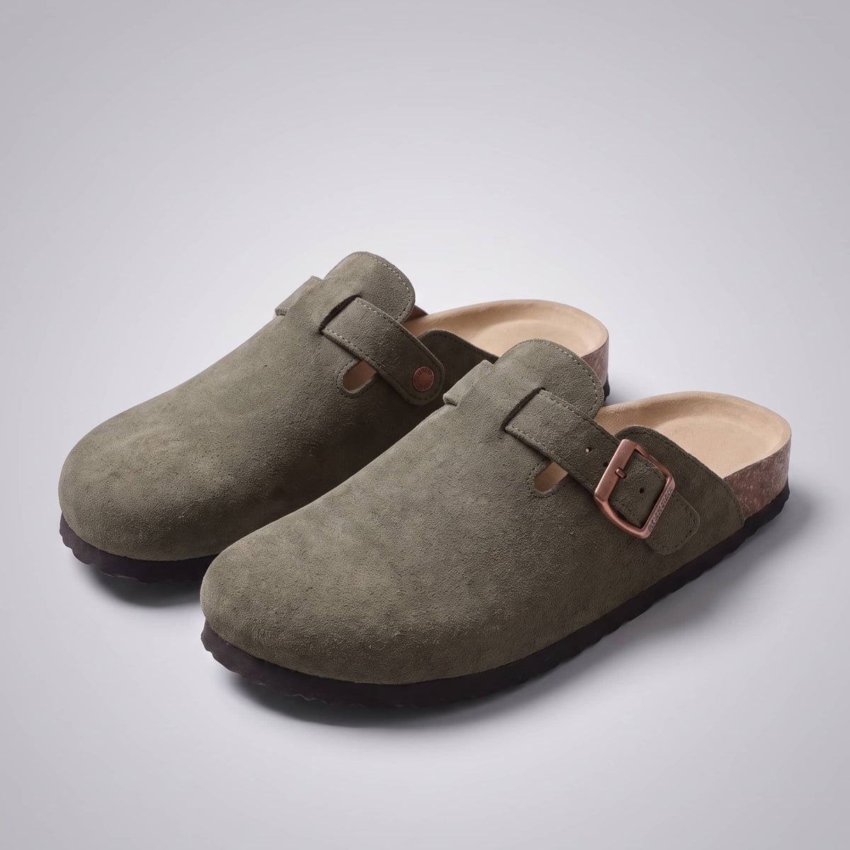 FORCIANO DAKOTA olive green height increasing slippers for women shown as a pair with premium suede uppers, buckle straps and closed toes.