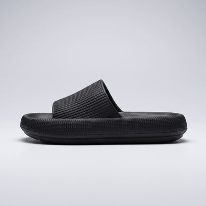 FORCIANO DUNE black height increasing shoes shown in side profile with a wide textured strap and cushioned sole visible.