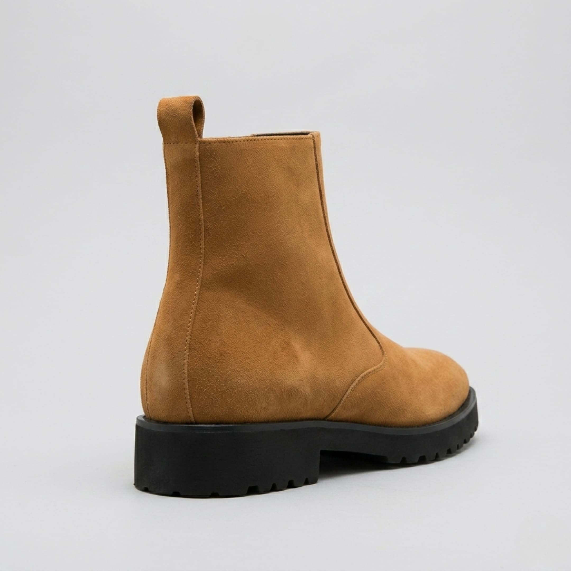 FORCIANO ECLIPSE brown suede Chelsea boot shown from the rear three-quarter angle with heel, pull tab and black sole visible.