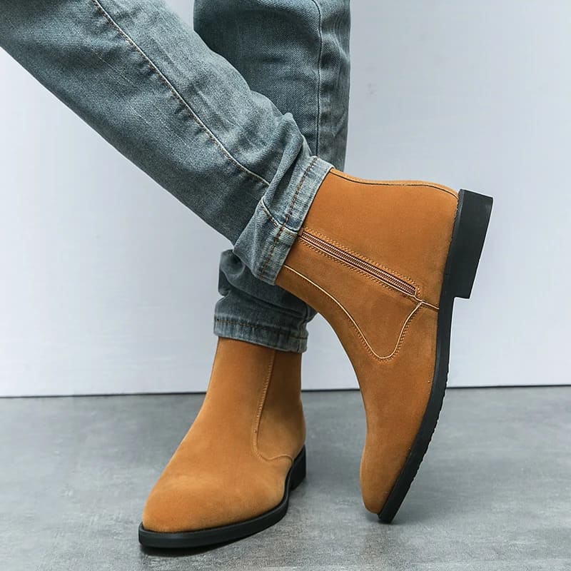 FORCIANO ECLIPSE brown suede Chelsea boots shown on foot, with the side zipper clearly visible on the raised boot.