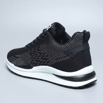 FORCIANO EDGE black Height Increasing Sneakers shown from a rear three-quarter angle with a white sole and breathable material for extended wear.