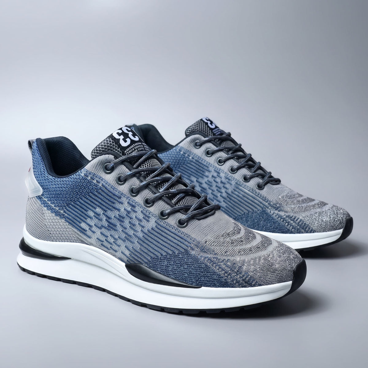 FORCIANO EDGE blue Height Increasing Sneakers with white soles, displayed as a pair from a front three-quarter view with breathable material.