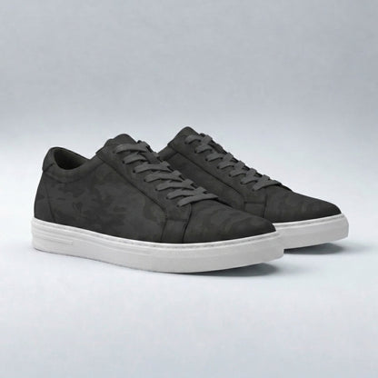 FORCIANO ELEMENT black premium leather Height increasing sneakers shown as a pair from an angled front view with dark laces, tonal patterned uppers, and white soles.