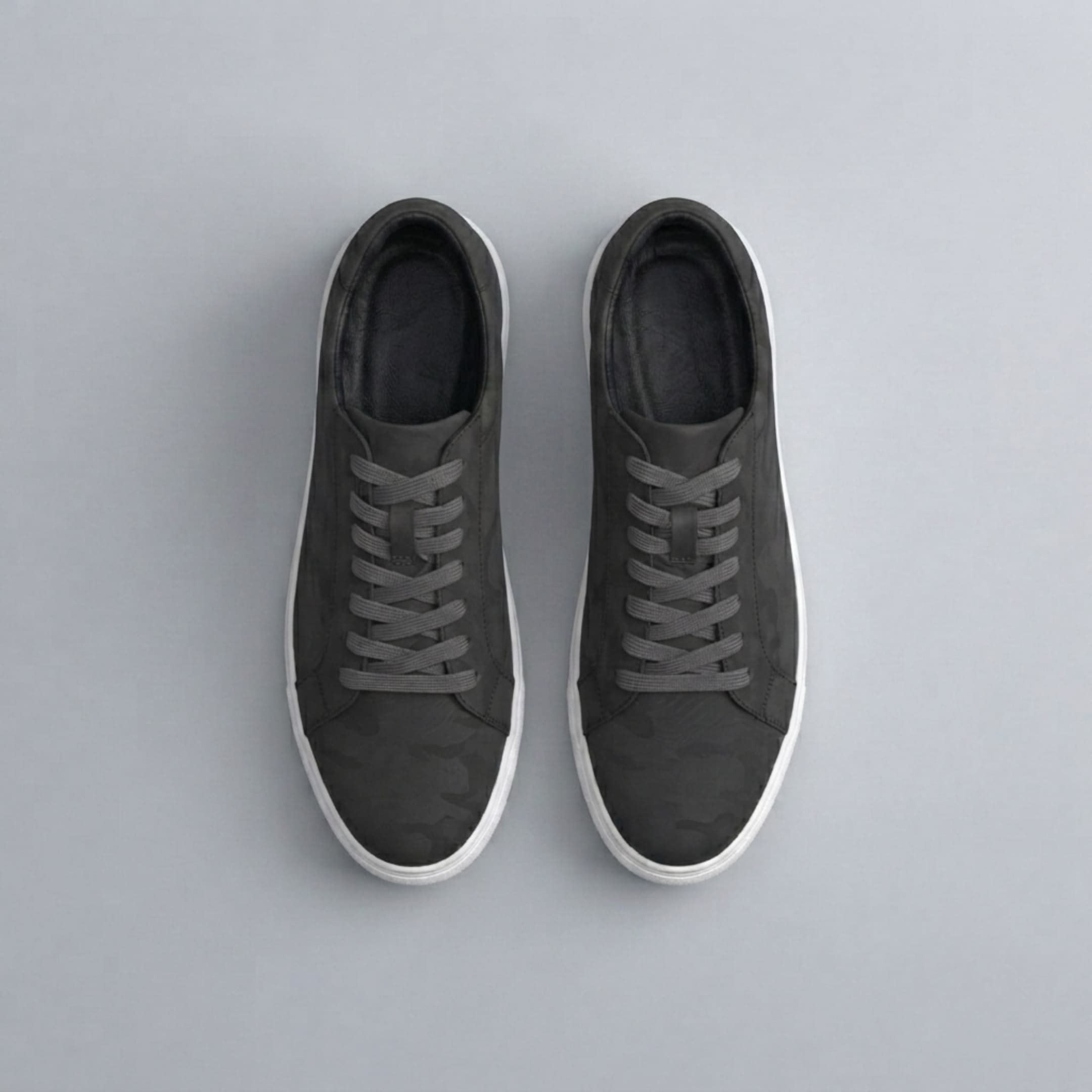 FORCIANO ELEMENT Height Increasing Sneakers in black, shown as a pair from a top view, featuring a premium leather upper and tonal lace-up design.