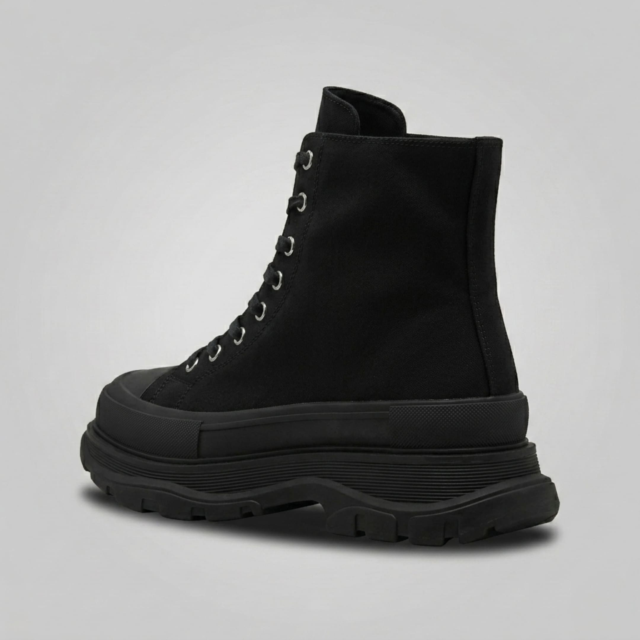 FORCIANO ELEVATOR black height increasing sneaker with thick cushioned construction shown from a rear three-quarter angle.