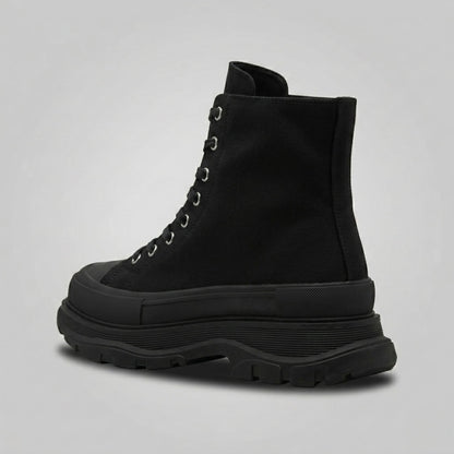 FORCIANO ELEVATOR black height increasing sneaker with thick cushioned construction shown from a rear three-quarter angle.