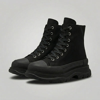 FORCIANO ELEVATOR black height increasing sneakers with thick cushioned high-top construction shown as a pair from a front three-quarter angle.