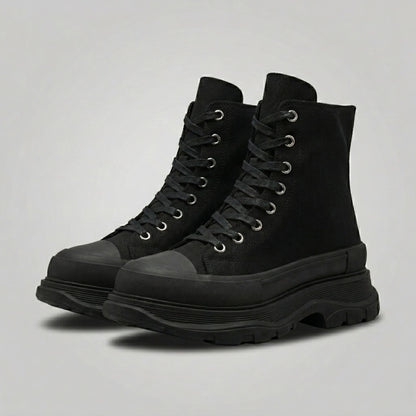 FORCIANO ELEVATOR black height increasing sneakers with thick cushioned high-top construction shown as a pair from a front three-quarter angle.