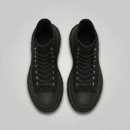 FORCIANO ELEVATOR black height increasing sneakers shown as a pair from the top with black laces and thick cushioned soles.