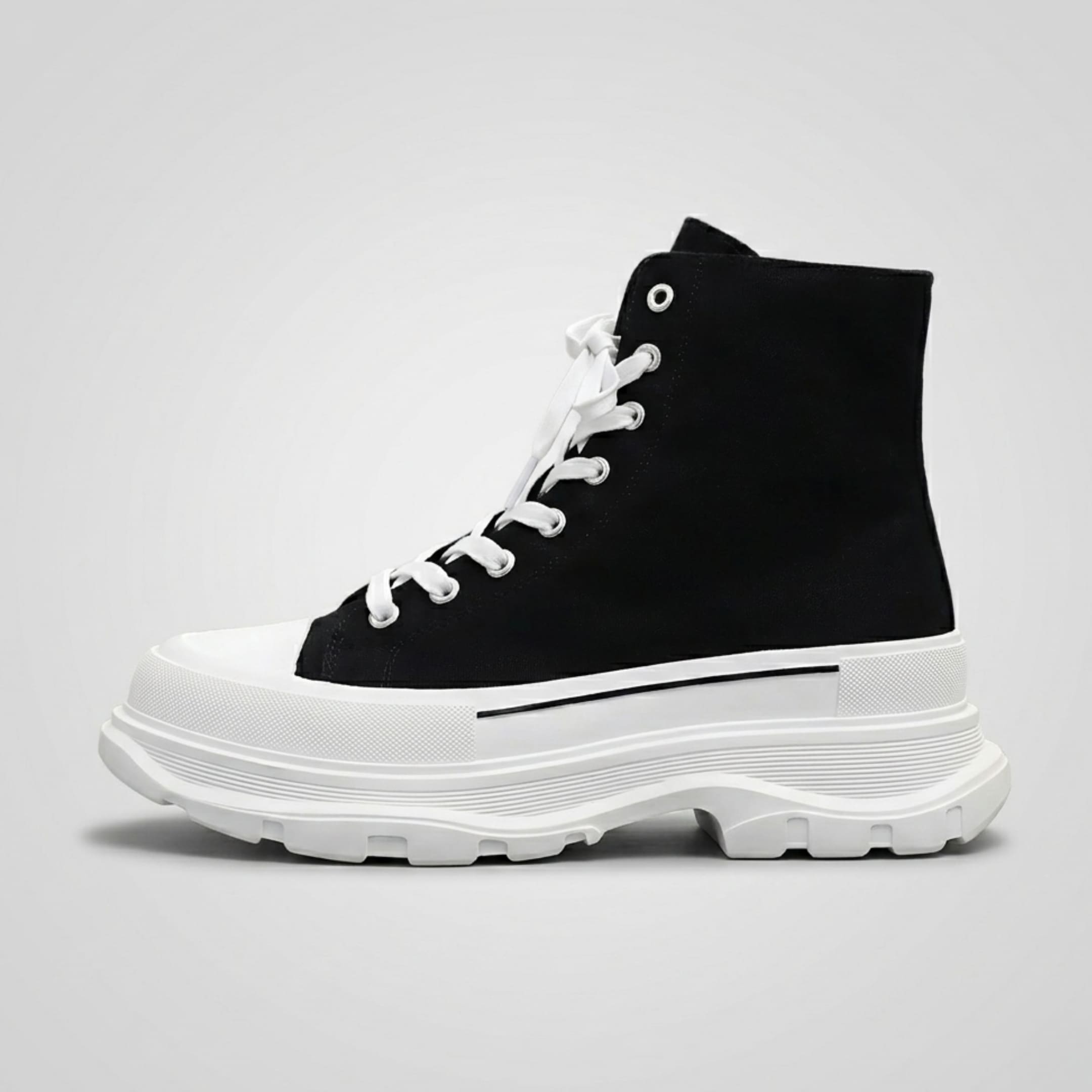 FORCIANO ELEVATOR black and white height increasing sneaker with white laces and thick cushioned sole shown in a clean side profile.