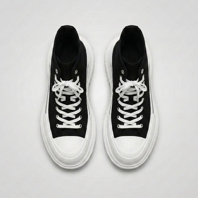 FORCIANO ELEVATOR black and white height increasing sneakers shown as a pair from the top with white laces and thick cushioned soles.