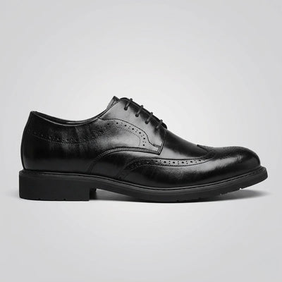 FORCIANO FAIRMONT black height increasing dress shoes shown in a full side profile with lace-up closure and brogue detailing.