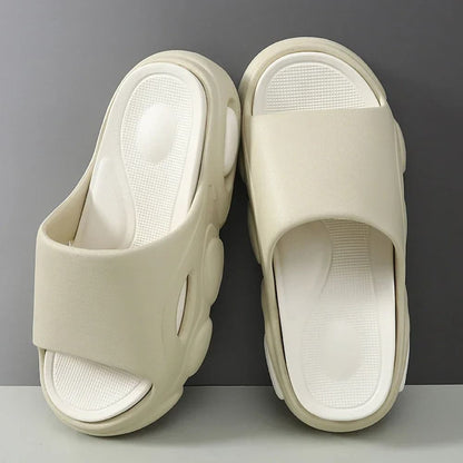 FORCIANO FEROX Beige-White height increasing slippers shown as a pair from a top three-quarter angle with the cushioned footbeds clearly visible.