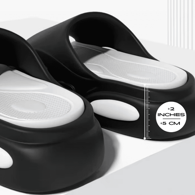 FORCIANO FEROX Black-White height increasing slippers by 5 cm / 2", shown in a close height measurement detail.