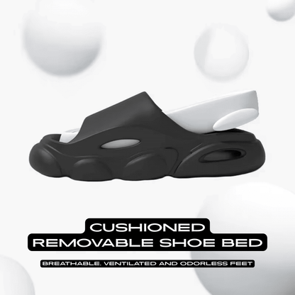 FORCIANO FEROX Black-White height increasing slippers feature graphic showing the cushioned removable shoe bed lifted above the EVA sole.