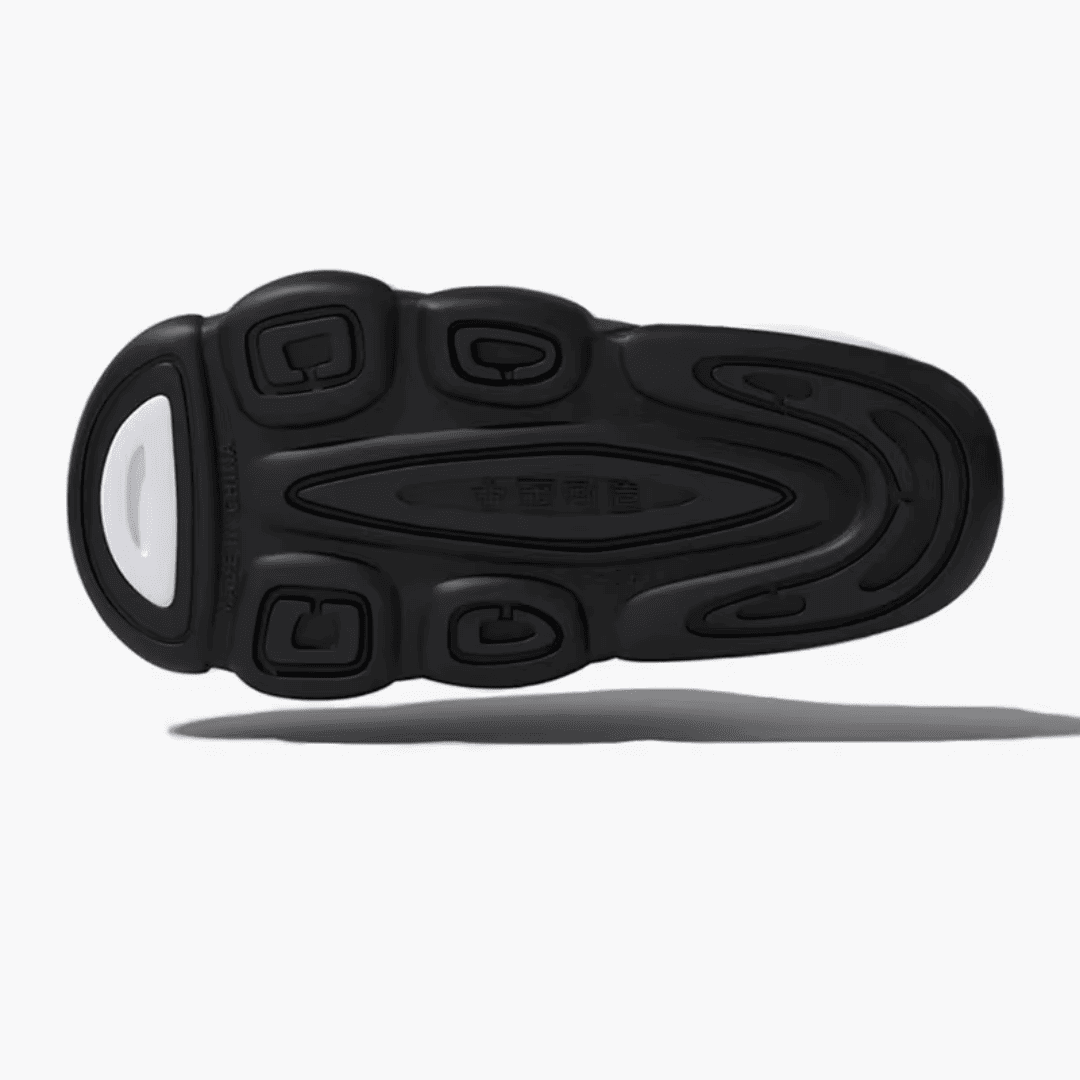 FORCIANO FEROX Black-White height increasing slippers shown from underneath with the black patterned outsole and contrasting heel insert visible.