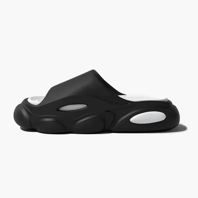 FORCIANO FEROX Black-White height increasing slippers in a clean side profile, showing the ultra-soft EVA construction.