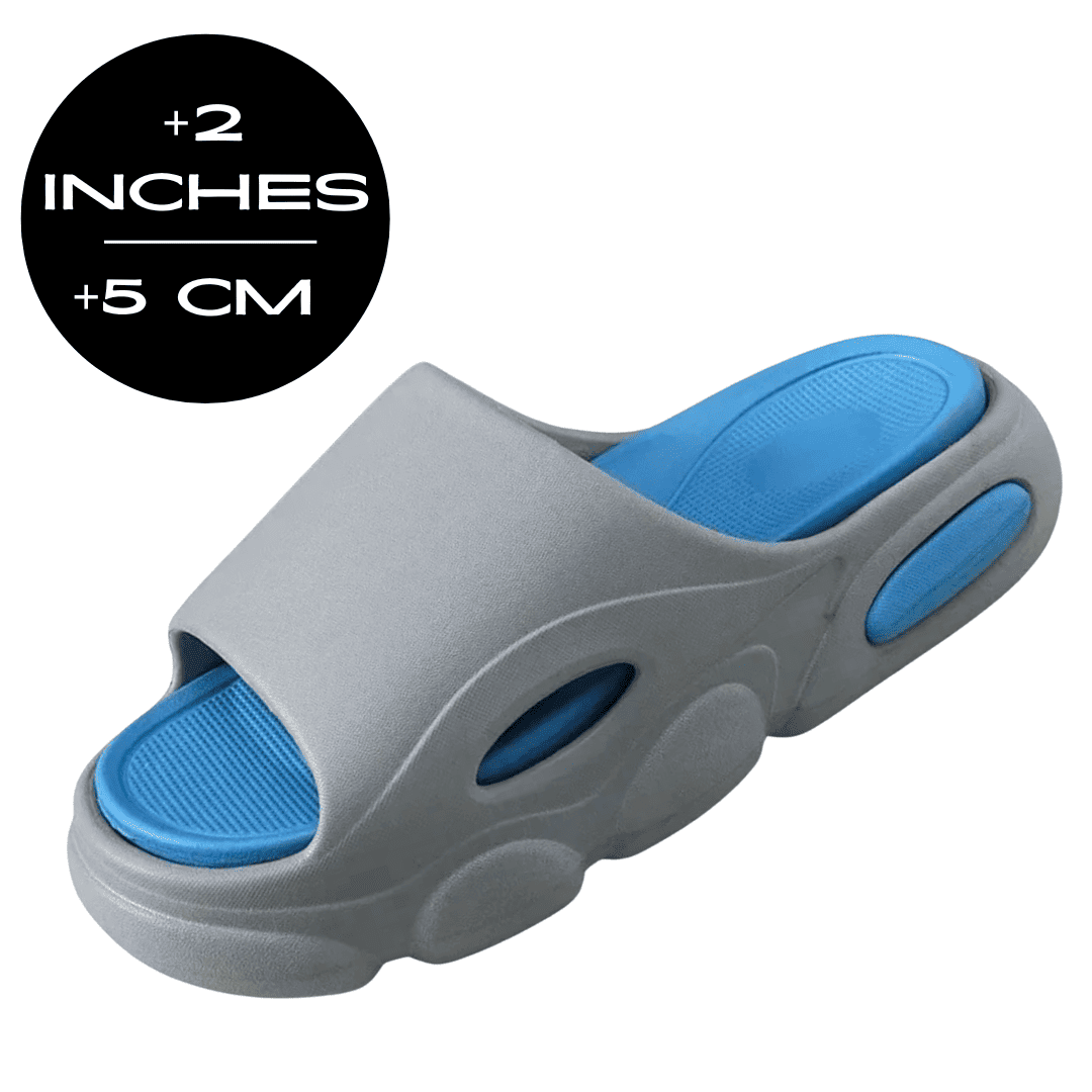 FORCIANO FEROX Grey-Blue height increasing slippers shown from a front three-quarter angle with 5 cm / 2" added height displayed.