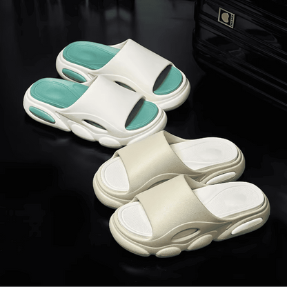 FORCIANO FEROX ultra-soft EVA height increasing slippers displayed as White-Green and Beige-White pairs on a dark background.