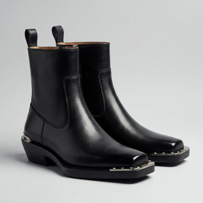 FORCIANO FERRANTE Elevator Boots in black, presented as a pair from a front three-quarter view with smooth microfiber uppers and square-toe metallic trim.