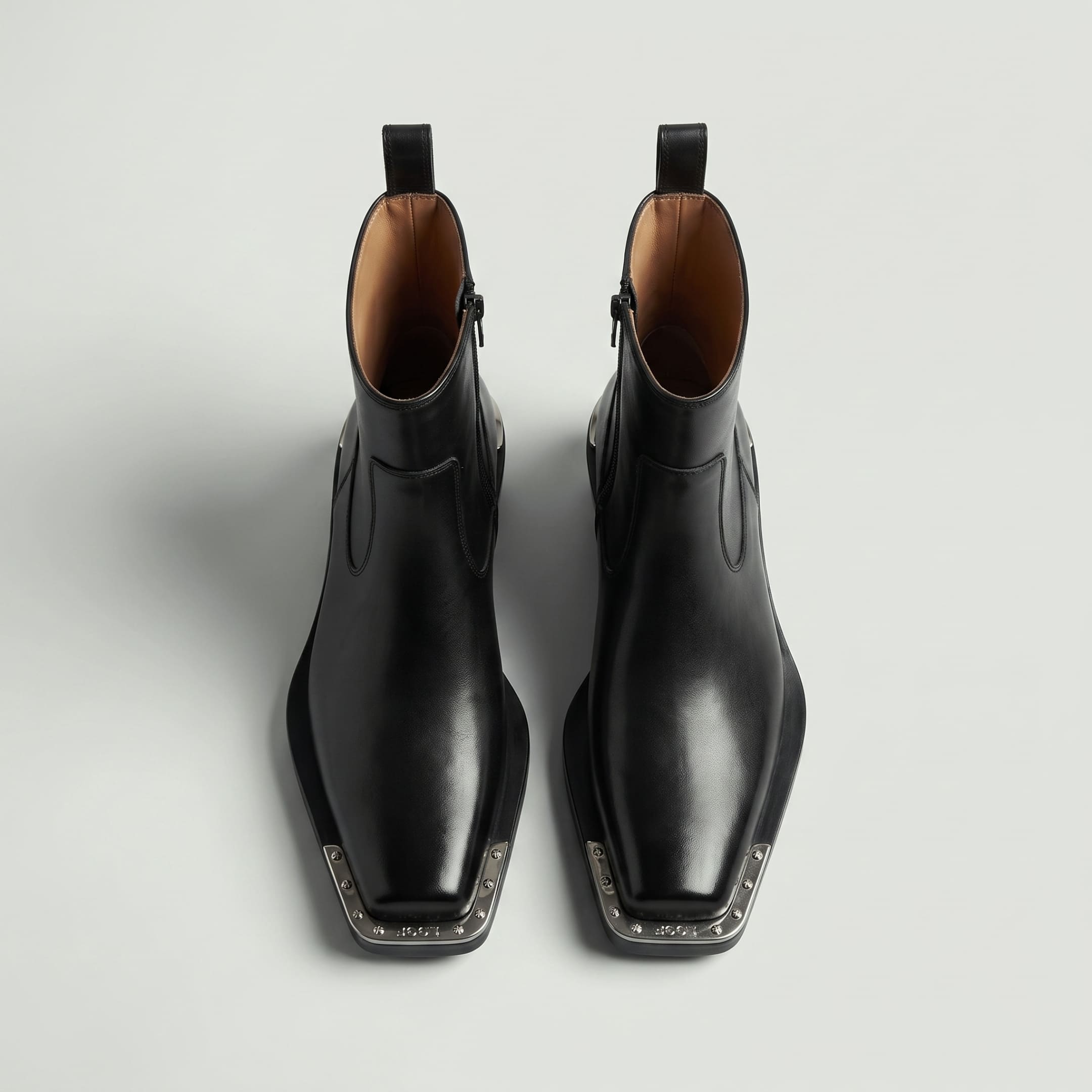 FORCIANO FERRANTE Elevator Boots in black, shown as a pair from a top-front view with smooth microfiber uppers, square toes, and metallic toe trim.