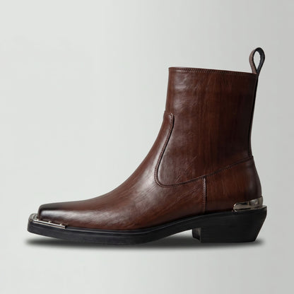 FORCIANO FERRANTE Elevator Boots in dark brown, displayed in side profile with a smooth microfiber upper, square toe, raised heel, and metallic trim.