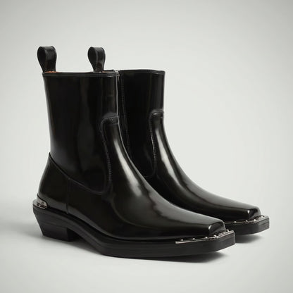 FORCIANO FERRANTE Elevator Boots in glossy black, displayed as a pair from a front three-quarter angle with smooth microfiber uppers and metallic toe trim.