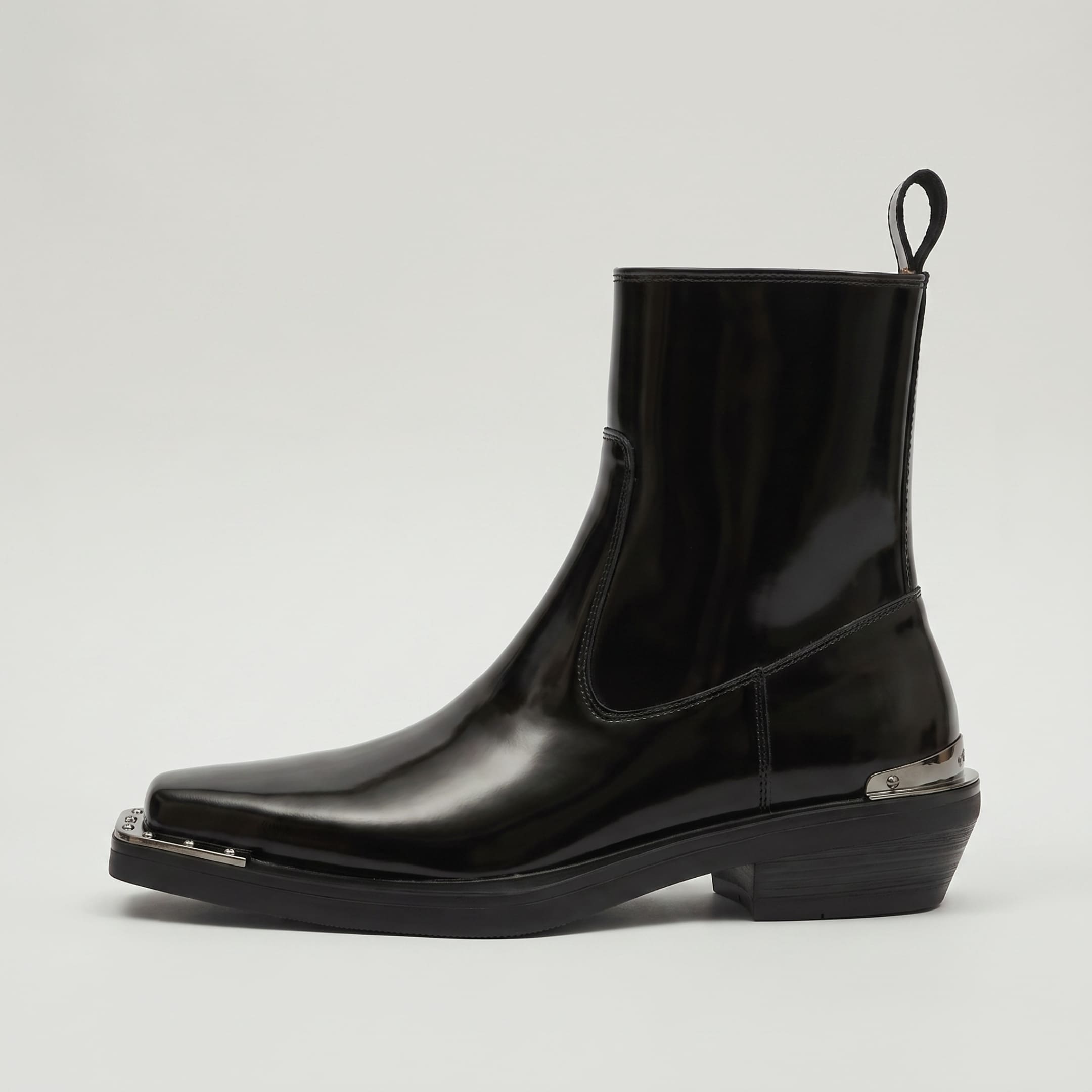 FORCIANO FERRANTE Elevator Boots in glossy black, shown in side profile with a smooth microfiber upper, square toe, pull tab, and metallic heel and toe accents.