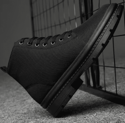 FORCIANO FORTITUDE black elevator boot shown in side profile, highlighting the lace-up upper and chunky black sole.