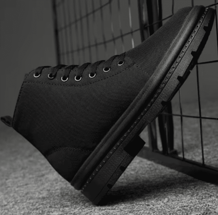 FORCIANO FORTITUDE black elevator boot shown in side profile, highlighting the lace-up upper and chunky black sole.