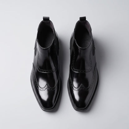 FORCIANO FORTRESS black Elevator Boots shown as a pair from the top view with polished finish and decorative perforated accents.