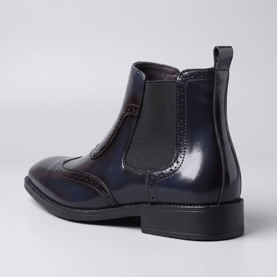 FORCIANO FORTRESS blue Elevator Boots shown from the rear three-quarter view with elastic side panel and heel pull tab.