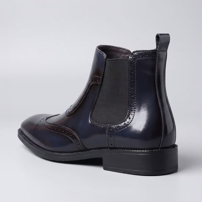 FORCIANO FORTRESS blue Elevator Boots shown from the rear three-quarter view with elastic side panel and heel pull tab.