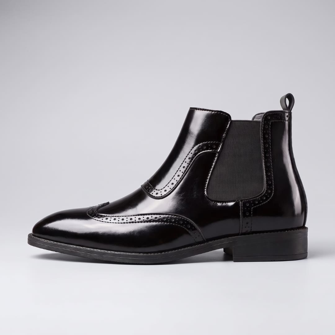 Black FORCIANO FORTRESS Elevator Boots in side profile showing the leather upper and elastic side panel