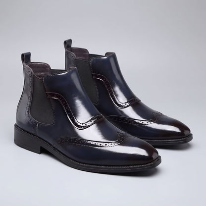 Pair of blue FORCIANO FORTRESS Elevator Boots showing leather uppers and elastic side panels