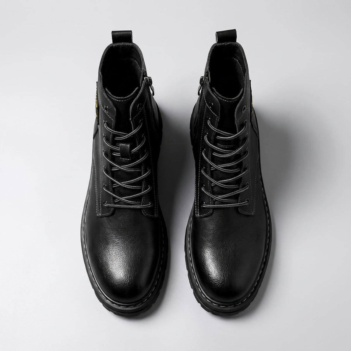 FORCIANO FRONTLINE Boots That Make You Taller in black premium leather shown as a pair from above with lace-up fronts.