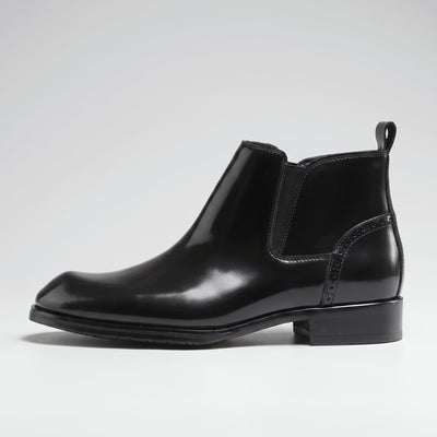 FORCIANO GARDA FOR MEN black elevator boots with genuine leather upper shown from the side with elastic panel and low heel.