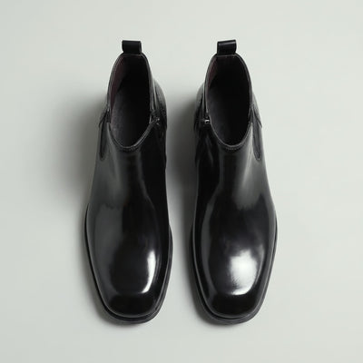 FORCIANO GARDA FOR MEN black elevator boots with genuine leather upper shown as a pair from above with pull tabs and ankle openings.