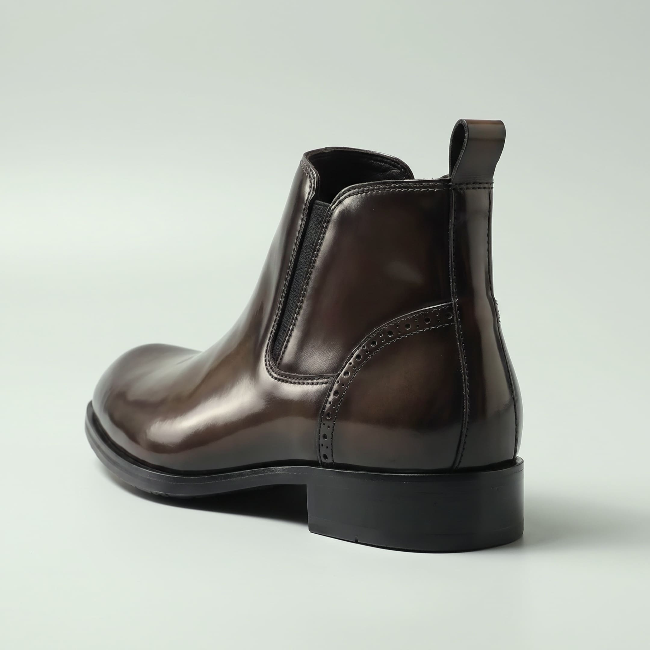 FORCIANO GARDA FOR MEN brown elevator boots with genuine leather upper shown from the rear three-quarter angle with pull tab and heel.