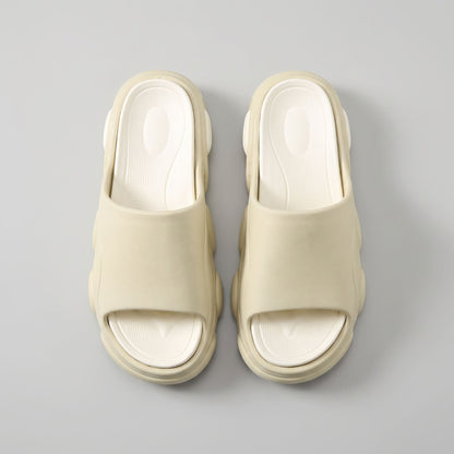 FORCIANO GLOW beige and white Height Increasing Slippers for Women shown as a pair from above with textured cushioned footbeds and wide straps visible.