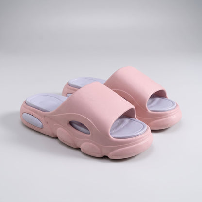 FORCIANO GLOW pink and purple Height Increasing Slippers for Women shown as a pair from a front angle with ultra-soft EVA construction and purple footbeds.