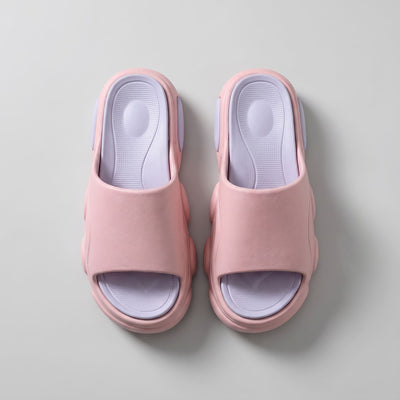 FORCIANO GLOW pink and purple Height Increasing Slippers for Women shown in a top-view pair with textured purple footbeds and wide pink straps.