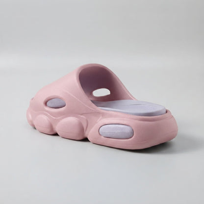 FORCIANO GLOW pink and purple Height Increasing Slippers for Women shown from a rear three-quarter angle with the cushioned purple footbed and sculpted EVA sole.