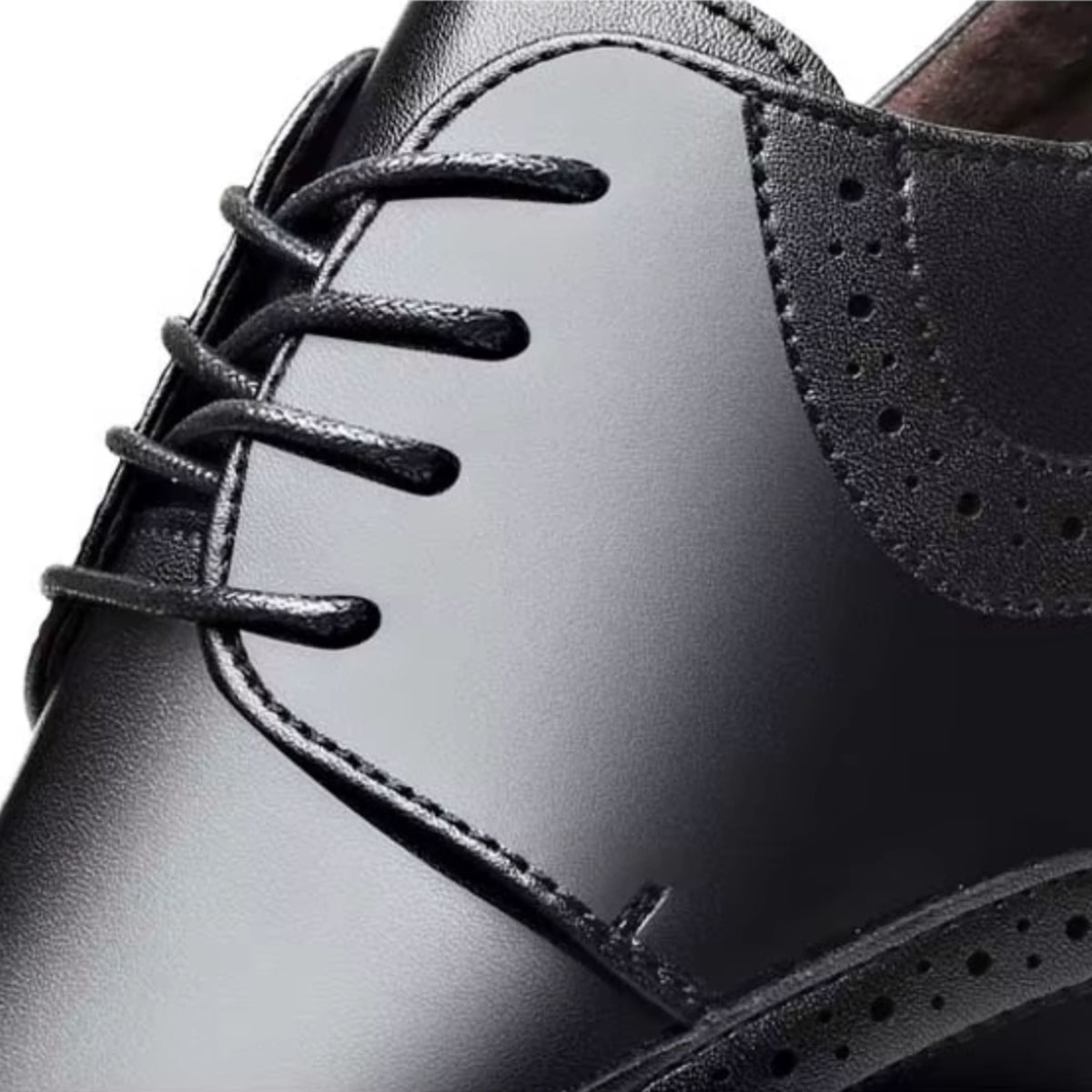 FORCIANO GRANDIOR black Height Increasing Shoes close-up showing the premium leather upper, lacing and perforated side detailing.