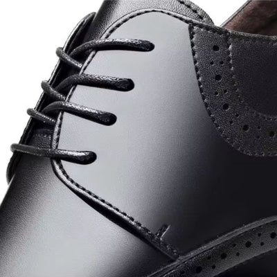 FORCIANO GRANDIOR black Height Increasing Shoes close-up showing the premium leather upper, lacing and perforated side detailing.