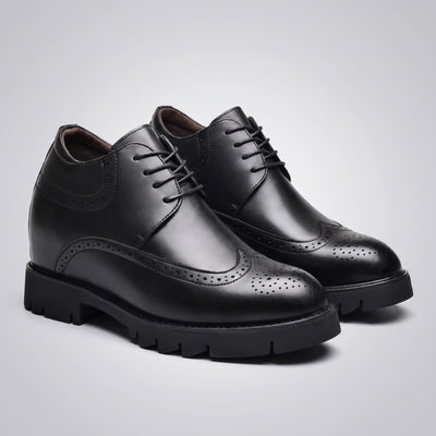 FORCIANO GRANDIOR black Height Increasing Shoes displayed as a pair from a front three-quarter angle with premium leather uppers and perforated toes.