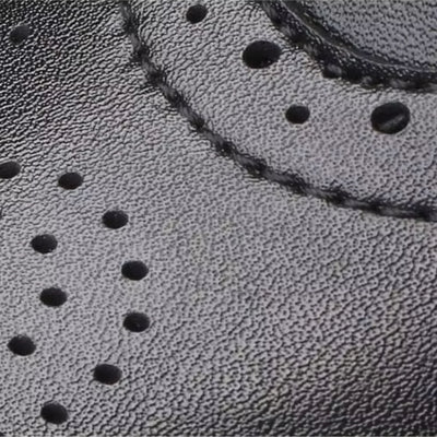 FORCIANO GRANDIOR black Height Increasing Shoes close-up showing the premium leather upper, stitching and decorative perforation detail.